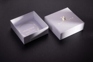 Box with gold hot stamp inside bottom.